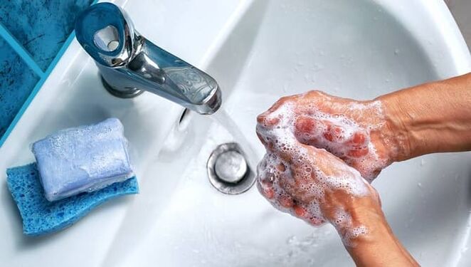 washing hands of parasites
